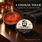 Cologne-scented hair wax in a warm premium grooming scene