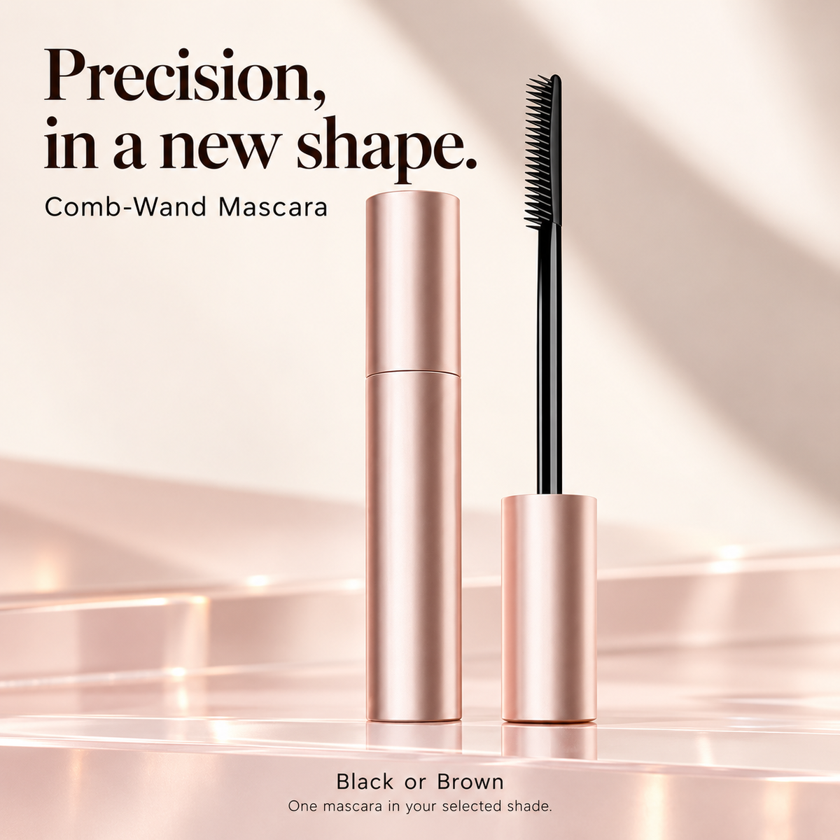 Rose-gold mascara tube and slim single-sided black comb applicator