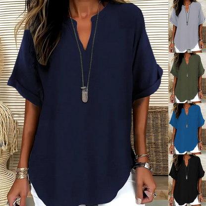 👚🔥Modieuze losse top met korte mouwen – V-hals met inkeping, asymmetrische zoom en lichtgewicht stof (5 kleuren, S–2XL) 🌸