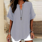 👚🔥Modieuze losse top met korte mouwen – V-hals met inkeping, asymmetrische zoom en lichtgewicht stof (5 kleuren, S–2XL) 🌸
